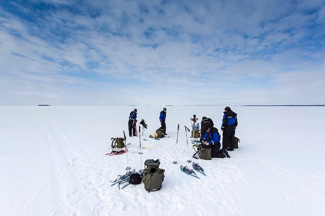 Arctic Day with Ice Fishing and Floating - Snowshoeing: more than a photo walk