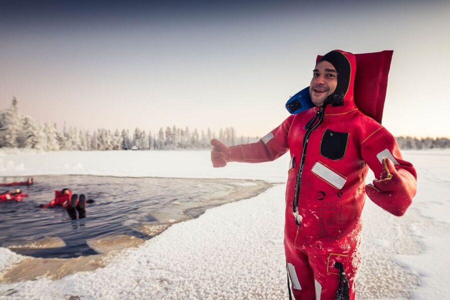 Daytime Ice Floating Rovaniemi, Frozen Lake Experience - The 3-hour flow: pickup, suit-up, lake time, fire-side recovery