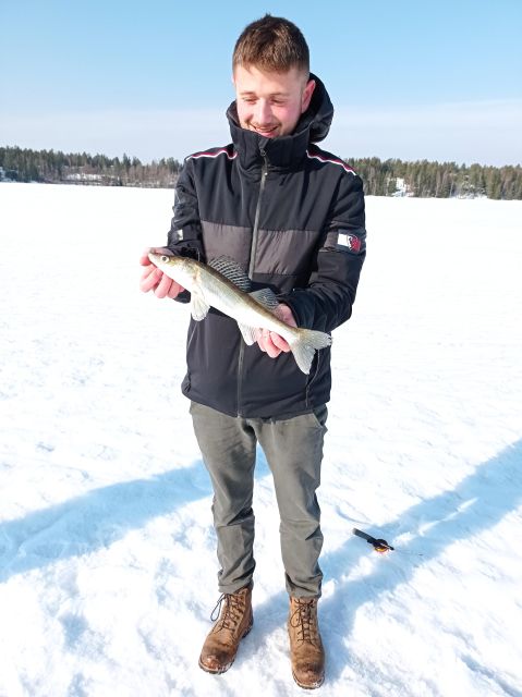 From Helsinki: Bodom Lake Ice Fishing with Food & Drinks - Laavu Fire, Makara Sausages, Glögi, and Piparri Cookies