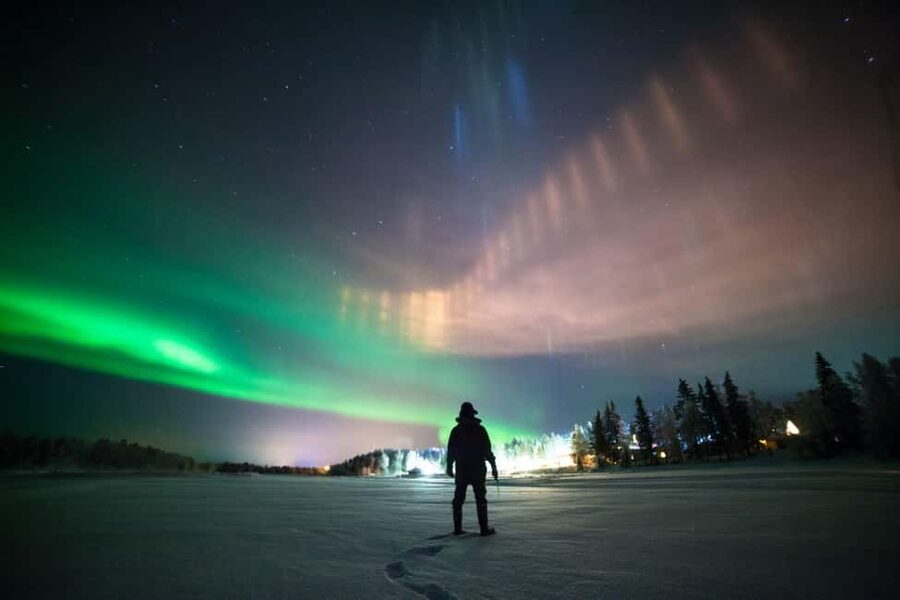 From Rovaniemi: Northern Lights Van Tour with Photos - The lake or river stop, campfire warmth, and Finnish snacks