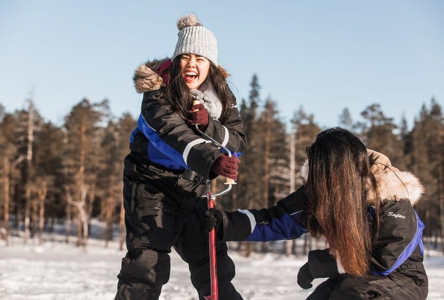 From Rovaniemi: Snowshoeing and Ice Fishing Tour - Ice fishing on a frozen lake: drilling, setting up, and patience