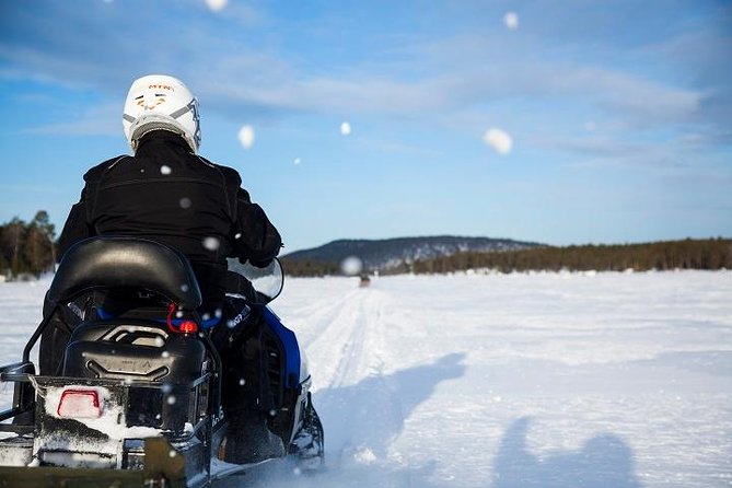 From Saariselkä: Ice Fishing Tour to Lake Inari, reindeers &lunch - Staying warm between bites: patience, silence, and the right rhythm