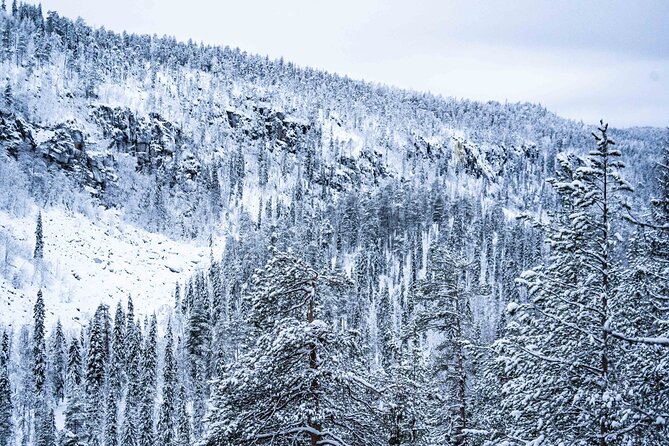 Frozen Waterfalls of Korouoma Canyon tour with Pro Photos & BBQ - Gear, boots, and what to wear under the provided warmth