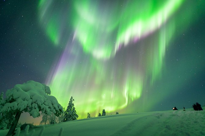 Hunting Northern Lights by Snowmobiles - What the guide teaches you about auroras and local mythology