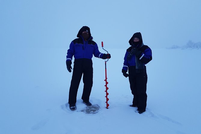 Ice fishing by car with hot beverages at Pyhä-Luosto - Car Pickup From Pyhä-Luosto, Then Straight to the Ice