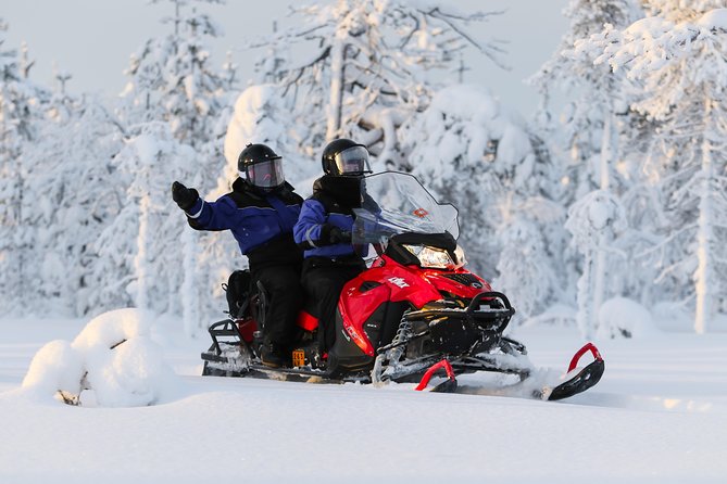 In Pursuit of Reindeer - Snowmobile safari to reindeer farm in Rovaniemi - Hopping onto a snowmobile: how the ride is set up