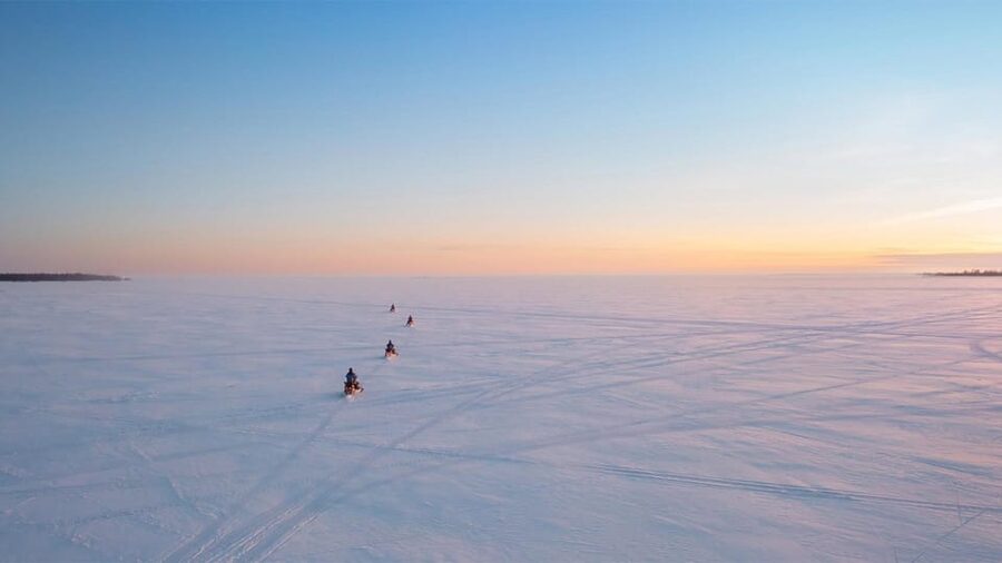 Kemi-Tornio: Ice Fishing Safari with Snowmobiles - The fishing setup: from drilling holes to catching fish