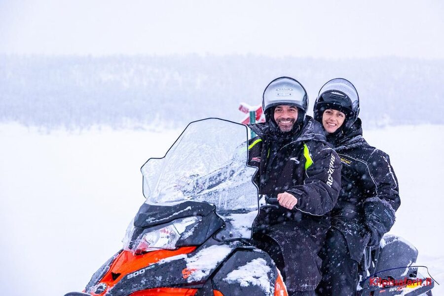 Kilpisjärvi: Border of Three Countries Snowmobile Safari - Snowmobile over Lake Kilpisjarvi: fast fun on still ice