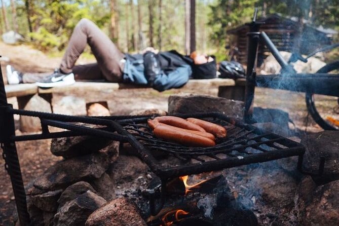 Korouoma canyon national park & frozen waterfalls with BBQ - BBQ Lunch After the Hike: Warming Up Like a Local