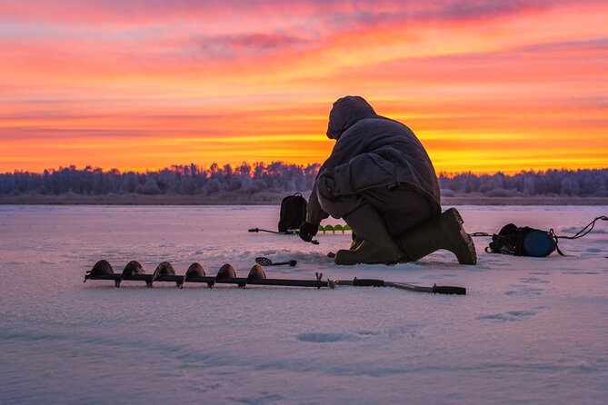 Lapland Ice Fishing Experience from Rovaniemi - Ice drilling: what you actually do on the frozen lake
