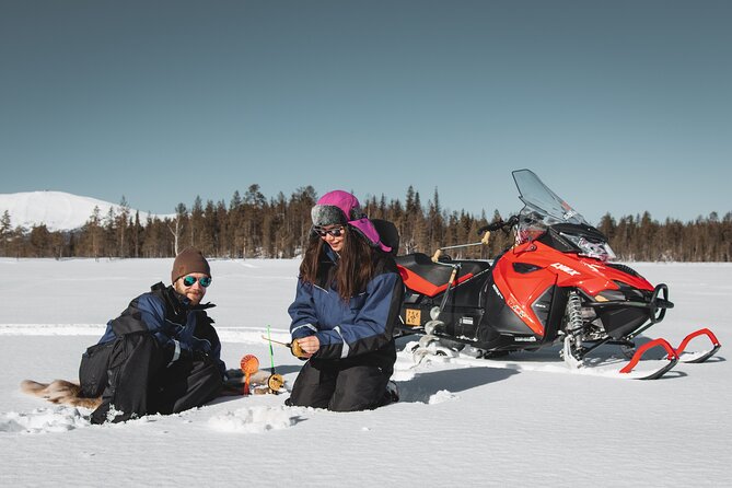 Lappish Lunch Break -Snowmobiling, ice fishing and tasty food - Learning ice fishing at the secret hole, hole-cutting and rod prep