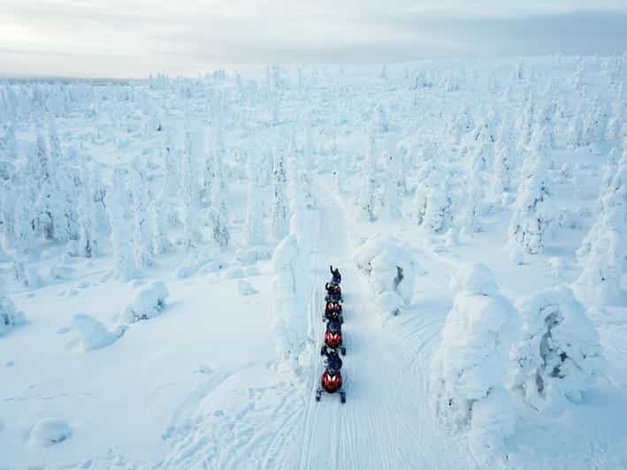 Levi: Easy Snowmobile Safari into the Nature - Entering Lapland by snowmobile tracks in Levi