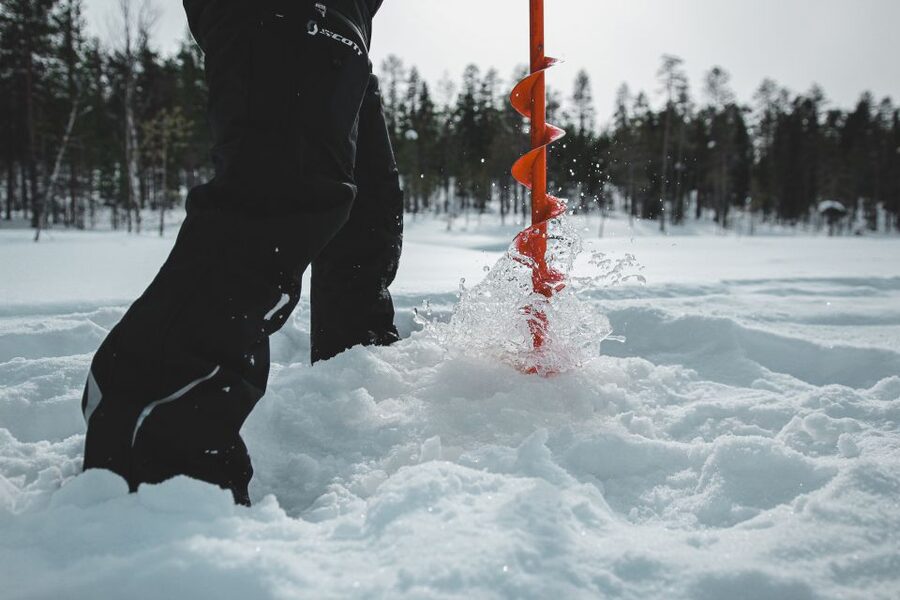 Levi: Finnish Ice Fishing Tour by Car - Drilling the Hole and Setting Up the Rod Like a Local