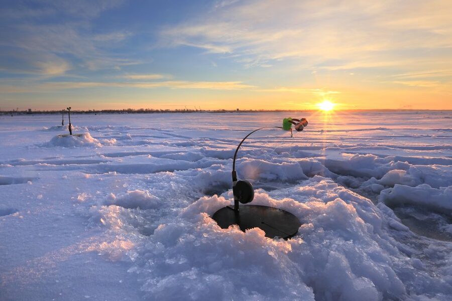 Levi: Ice Fishing by Snowmobile - At the Frozen Lake: Drilling a Hole and Catching Fish