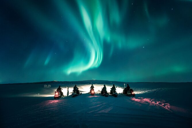 Northern Lights Snowmobile Safari from Rovaniemi with Campfire Picnic - A 7 pm snowmobile run that fits the aurora window