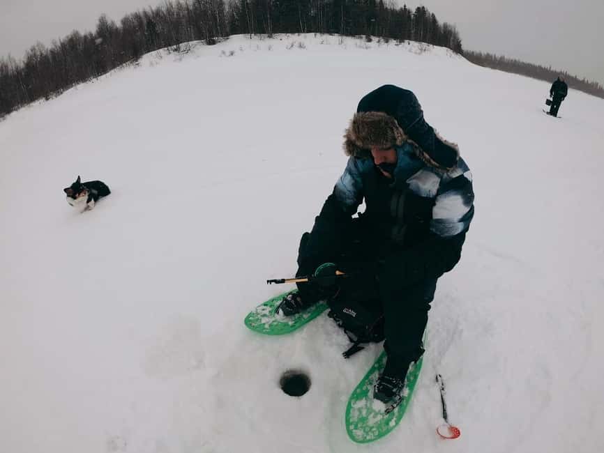 Pyhä: Ice Fishing Experience at Frozen Lake - Drilling the hole on a frozen lake, the real start of the day