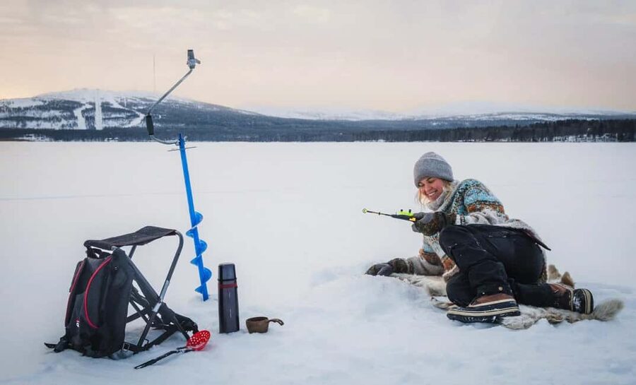 Pyhä: Ice Fishing Experience at Frozen Lake - Starting at Lucky Ranch Saloon near Pyhätunturi