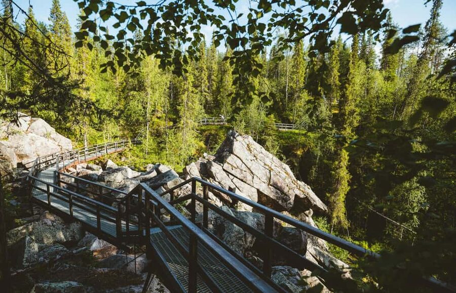 Rovaniemi: Auttiköngäs Waterfall Hike & Wilderness BBQ - Mid-hike break: hot drinks and wilderness BBQ by the fire