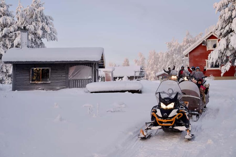 Rovaniemi: Ice Fishing and Snowmobile Tour with Snacks - Rovaniemi Snowmobile onto the Frozen Lake