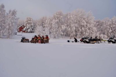 Ice Fishing and Snowmobile Tour with Snacks