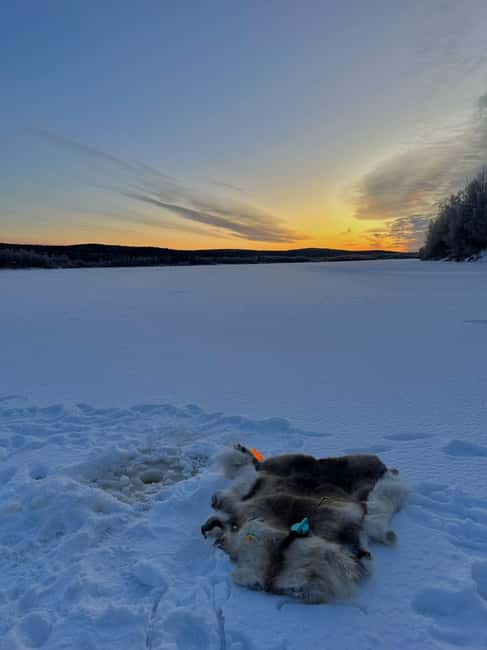 Rovaniemi: Ice Fishing The Finnish Way - Shaman Village start: Glass igloos, then fire-side calm