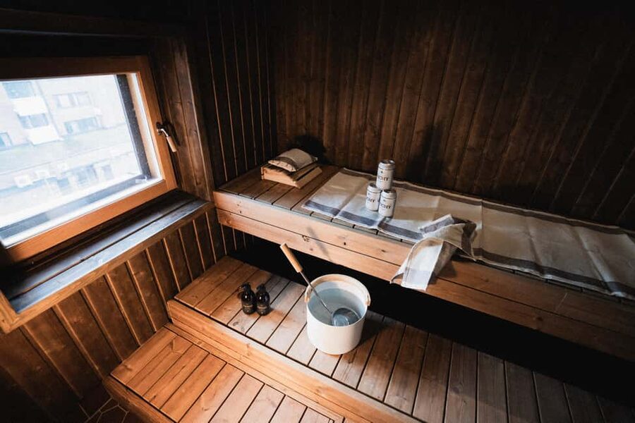 Rovaniemi: Private Sauna and Lounge - The lounge setup: fridge, microwave, and real downtime