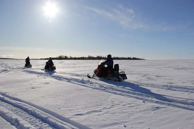 Snowmobile Adventure in Lapland - Midway stops, warm drinks, and the stories your guide shares