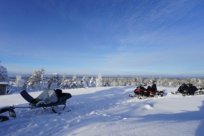 Snowmobile drive experience - The end-of-day payoff: cabin warmth, hot drinks, and sausages by the fire