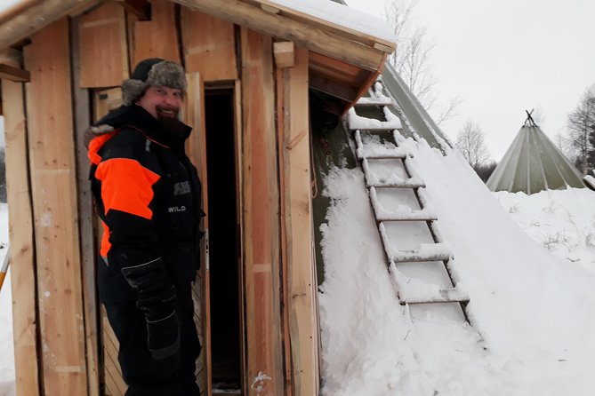 Snowmobile Safari to Lake Inari, meet & feed Reindeers, Lunch - Lunch in a teepee by open fire: warm food, real comfort