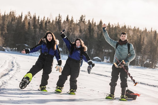 Snowshoeing and Ice Fishing Tour - Ice fishing on a frozen lake: learning, waiting, and staying steady