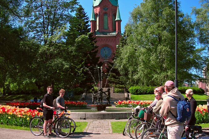 Tampere Scenic Bike Tour with Sauna and Local Flavors - Getting started at Keskustori, then stepping into Aleksanterin Kirkko