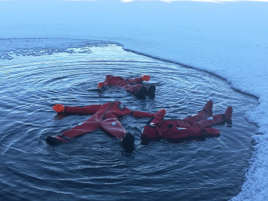 Ylläs: Lake Ylläsjärvi Ice-Floating Experience - Rescue Suits and Safety in Near-Freezing Water