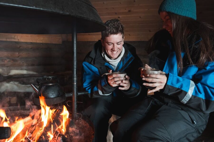 Ylläs: Snowmobile Adventure with Ice Fishing - Ice fishing instruction on frozen water, with real expectations